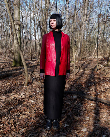 This vintage red leather jacket from the 80s is anything but outdated. With light shoulder pads to add structure, it's the statement piece!