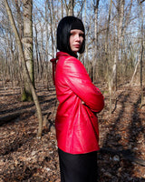 This vintage red leather jacket from the 80s is anything but outdated. With light shoulder pads to add structure, it's the statement piece!