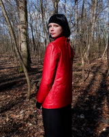 This vintage red leather jacket from the 80s is anything but outdated. With light shoulder pads to add structure, it's the statement piece!