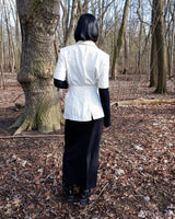 Slip into effortless luxury with this vintage Max Mara pure linen blouse — straight from the golden age of 90s Italian fashion. With its sharp lapels, sculpted silhouette, and waist-defining belt, it’s pure understated power dressing. Made from 100% premium linen, it’s light, luxe, and built for those sun-drenched days. Vintage Max Mara never goes out of style.