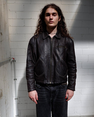 Upgrade your wardrobe with a real classic! The Premium Vintage 1957 Legendary Firenze leather jacket will elevate your style with its luxurious, waxy feel and deep, chocolate brown hue.