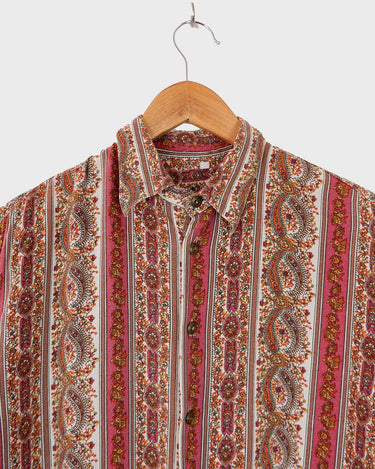 Unlock your inner 70s child with this groovy vintage blouse! Featuring an all-over 70s pattern on soft viscose fabric, this comfy top is perfect for adding a little retro flair to your wardrobe. Sassy yet subtle, you'll be feeling the 70s vintage power in no time!