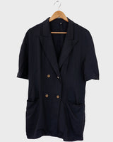 Revive 90s vintage flair with this black short sleeve summer blazer! Clothe yourself in minimalism design, featuring a long cut and super light fabric.