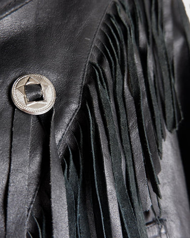 Add some wild vibes to your wardrobe with this vintage 80s 90s black fringe leather jacket. Complete with conchos and a belt, this jacket will be a statement piece for any outfit.