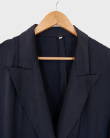 Revive 90s vintage flair with this black short sleeve summer blazer! Clothe yourself in minimalism design, featuring a long cut and super light fabric.