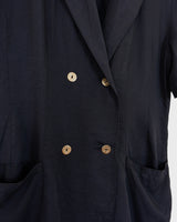 Revive 90s vintage flair with this black short sleeve summer blazer! Clothe yourself in minimalism design, featuring a long cut and super light fabric.