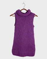Introducing this handmade purple long turtlekneck slipover! The colorful melange design adds a playful twist to this cozy XS-S fit, perfect for layering.