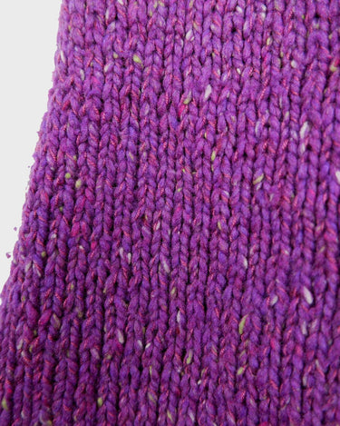 Introducing this handmade purple long turtlekneck slipover! The colorful melange design adds a playful twist to this cozy XS-S fit, perfect for layering.