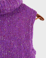 Introducing this handmade purple long turtlekneck slipover! The colorful melange design adds a playful twist to this cozy XS-S fit, perfect for layering.