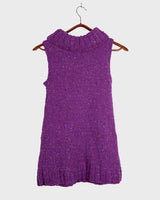 Introducing this handmade purple long turtlekneck slipover! The colorful melange design adds a playful twist to this cozy XS-S fit, perfect for layering.