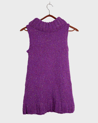 Introducing this handmade purple long turtlekneck slipover! The colorful melange design adds a playful twist to this cozy XS-S fit, perfect for layering.