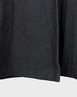 Add some edge to your wardrobe with this Vintage 80s/90s wool coat. The dark grey/black color combination and velvet hood give off a grunge vibe!