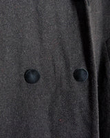 Add some edge to your wardrobe with this Vintage 80s/90s wool coat. The dark grey/black color combination and velvet hood give off a grunge vibe!