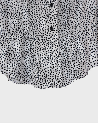 It's shimmery, it's polka-dotted, and it's totally 80s! Add a little pizzaz to your wardrobe with this classic 80s vintage blouse.