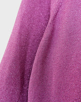 Sprinkle some sparkle into your wardrobe with this Y2k Laura Ashley pink glitter shirt! The 3/4 sleeves make it versatile for any occasion. This shirt is perfect for those who love a little extra shine in their outfits!