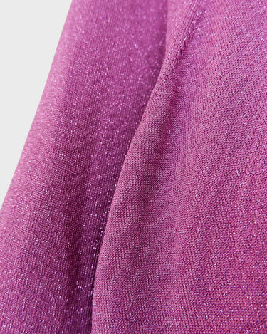 Sprinkle some sparkle into your wardrobe with this Y2k Laura Ashley pink glitter shirt! The 3/4 sleeves make it versatile for any occasion. This shirt is perfect for those who love a little extra shine in their outfits!