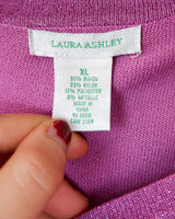 Sprinkle some sparkle into your wardrobe with this Y2k Laura Ashley pink glitter shirt! The 3/4 sleeves make it versatile for any occasion. This shirt is perfect for those who love a little extra shine in their outfits!