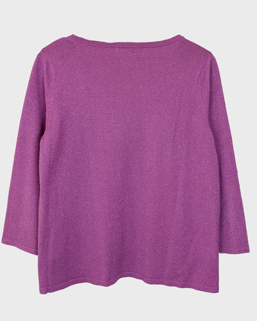 Sprinkle some sparkle into your wardrobe with this Y2k Laura Ashley pink glitter shirt! The 3/4 sleeves make it versatile for any occasion. This shirt is perfect for those who love a little extra shine in their outfits!