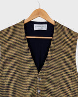 Time to class up your wardrobe with this vintage 90s checkered wool vest!