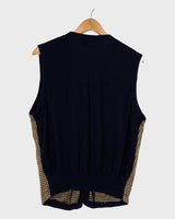 Time to class up your wardrobe with this vintage 90s checkered wool vest!