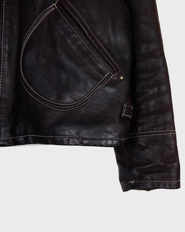 Upgrade your wardrobe with a real classic! The Premium Vintage 1957 Legendary Firenze leather jacket will elevate your style with its luxurious, waxy feel and deep, chocolate brown hue.