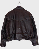 Upgrade your wardrobe with a real classic! The Premium Vintage 1957 Legendary Firenze leather jacket will elevate your style with its luxurious, waxy feel and deep, chocolate brown hue.