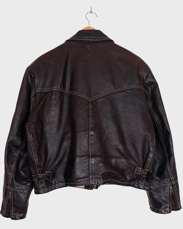 Upgrade your wardrobe with a real classic! The Premium Vintage 1957 Legendary Firenze leather jacket will elevate your style with its luxurious, waxy feel and deep, chocolate brown hue.