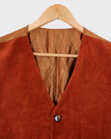 This Vintage 90s brown classy suede leather vest is taking boho vibes to the max! Complete your next festival look in with this vest.