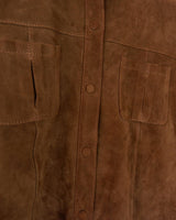 Experience the smoothness with this Vintage 90s classy brown faux suede leather shirt! Carefully crafted with velvety soft faux suede leather fabric, this piece adds a timeless touch of the 90s to any outfit. The press studs complete the look, making you a true smooth operator!