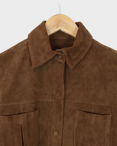 Experience the smoothness with this Vintage 90s classy brown faux suede leather shirt! Carefully crafted with velvety soft faux suede leather fabric, this piece adds a timeless touch of the 90s to any outfit. The press studs complete the look, making you a true smooth operator!