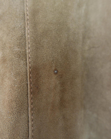 Experience the smoothness with this Vintage 90s classy brown faux suede leather shirt! Carefully crafted with velvety soft faux suede leather fabric, this piece adds a timeless touch of the 90s to any outfit. The press studs complete the look, making you a true smooth operator!