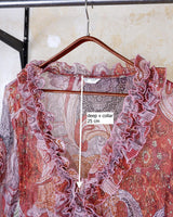 Feel like a fairy in this Vintage 90s pink-multicolor transparent volant silk mix blouse! With its deep V collar and light shimmer, this blouse is like a fairy tale. Perfect for adding some magical vibes to your wardrobe.