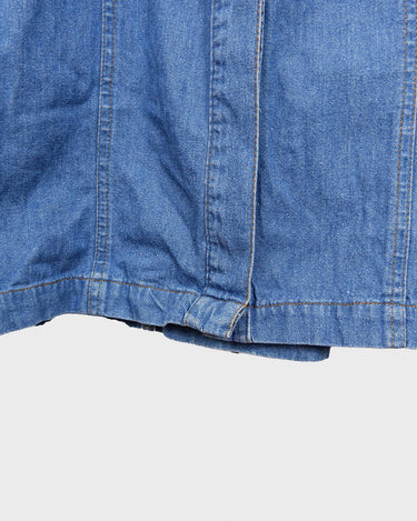 This vintage '90s denim maxi dress is a living legend! Its blue shade and back lacing detail is sure to give you an edge, so be ready to feel the spirit of it!