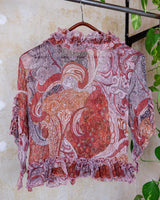 Feel like a fairy in this Vintage 90s pink-multicolor transparent volant silk mix blouse! With its deep V collar and light shimmer, this blouse is like a fairy tale. Perfect for adding some magical vibes to your wardrobe.
