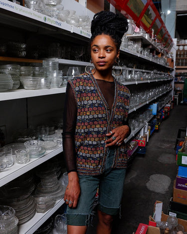 Capture some Missoni-inspired magic with this vintage 80s vest!