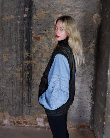 This Vintage 80s denim lamb leather patchwork bomber jacket AND vest is the perfect balance of oldschool and casual charm. Made with high quality materials, it's a statement piece that will add a touch of vintage to any outfit.