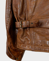 Fall in love with this italian vintage 80s brown leather jacket! With its classic look, warm wool lining, and thick leather material, you'll look and feel great while staying cozy!