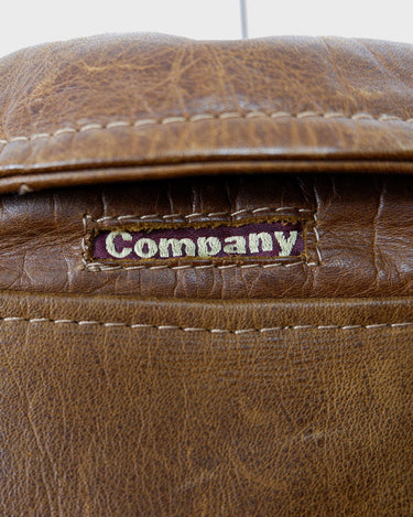 Fall in love with this italian vintage 80s brown leather jacket! With its classic look, warm wool lining, and thick leather material, you'll look and feel great while staying cozy!
