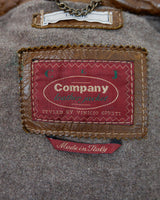 Fall in love with this italian vintage 80s brown leather jacket! With its classic look, warm wool lining, and thick leather material, you'll look and feel great while staying cozy!