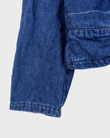 Indulge in your love for denim with this vintage 80s two rows blazer in classic blue. A must-have for any denim enthusiast, this jacket is a timeless addition to your wardrobe.