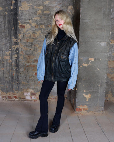 This Vintage 80s denim lamb leather patchwork bomber jacket AND vest is the perfect balance of oldschool and casual charm. Made with high quality materials, it's a statement piece that will add a touch of vintage to any outfit.
