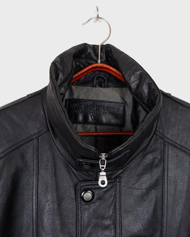 Add some edge to your wardrobe with this must-have preloved Westbury black leather coat. Perfect for cooler weather, this stylish piece will take any outfit to the next level!