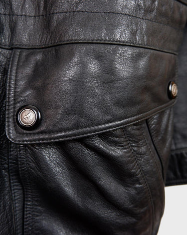 Add some edge to your wardrobe with this must-have preloved Westbury black leather coat. Perfect for cooler weather, this stylish piece will take any outfit to the next level!
