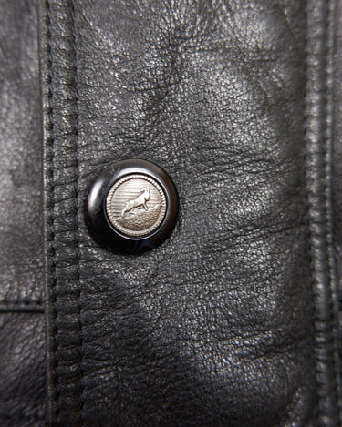 Add some edge to your wardrobe with this must-have preloved Westbury black leather coat. Perfect for cooler weather, this stylish piece will take any outfit to the next level!