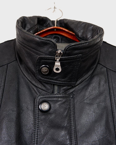 Add some edge to your wardrobe with this must-have preloved Westbury black leather coat. Perfect for cooler weather, this stylish piece will take any outfit to the next level!