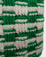 This handmade knit vest in rich green and cream tones is a true eye-catcher. Crafted from wool blend yarn and finished with natural wooden buttons, it blends cozy texture with bold design. The chunky crochet style and timeless check pattern make it perfect for layering.