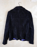 Add some sass to your wardrobe with our Preloved black plisee spring blazer! This elegant piece features light shoulder pads for structure and flare, while the plisee design adds an eye-catching touch