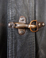 Introducing this Vintage 80s black fireman clasp leather coat, a must-have piece for your collection. Made of buttery soft leather, this coat exudes a cool and edgy vibe.