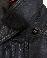 Introducing this Vintage 80s black fireman clasp leather coat, a must-have piece for your collection. Made of buttery soft leather, this coat exudes a cool and edgy vibe.