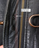 Introducing this Vintage 80s black fireman clasp leather coat, a must-have piece for your collection. Made of buttery soft leather, this coat exudes a cool and edgy vibe.